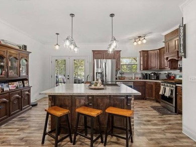 Lake Living at Its Finest! Discover this stunning 4-bedroom - photo 9