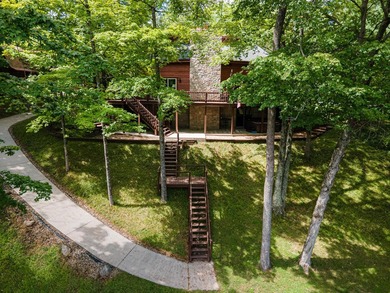 This visually stunning, premier lakefront log home on a - photo 12