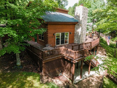 This visually stunning, premier lakefront log home on a - photo 14