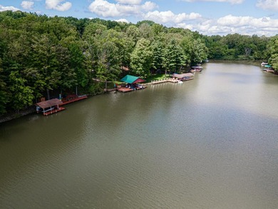 This visually stunning, premier lakefront log home on a - photo 16