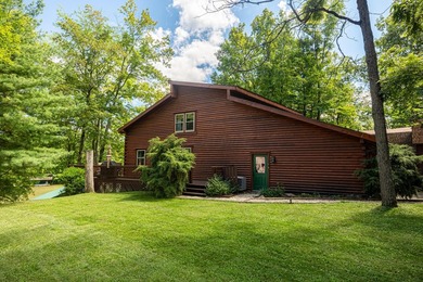 This visually stunning, premier lakefront log home on a - photo 27