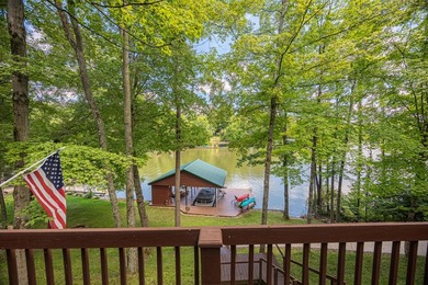 This visually stunning, premier lakefront log home on a - photo 29