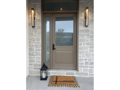 Welcome to this stunning luxury townhome that masterfully blends - photo 1