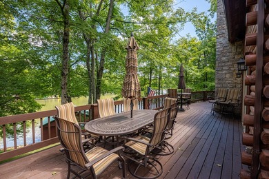 This visually stunning, premier lakefront log home on a - photo 32