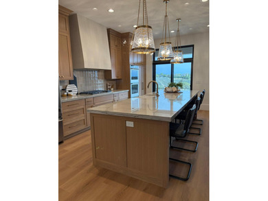 Welcome to this stunning luxury townhome that masterfully blends - photo 2