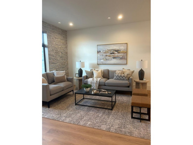 Welcome to this stunning luxury townhome that masterfully blends - photo 3
