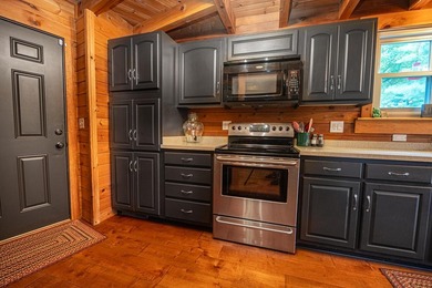This visually stunning, premier lakefront log home on a - photo 42