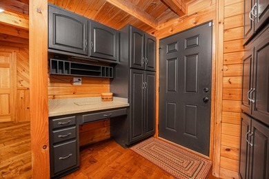 This visually stunning, premier lakefront log home on a - photo 43
