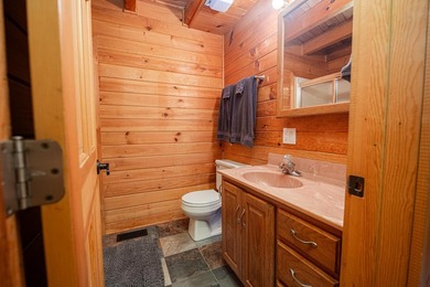 This visually stunning, premier lakefront log home on a - photo 44