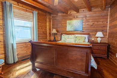 This visually stunning, premier lakefront log home on a - photo 46