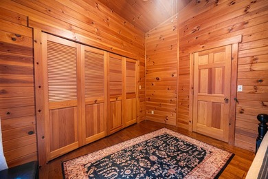 This visually stunning, premier lakefront log home on a - photo 51