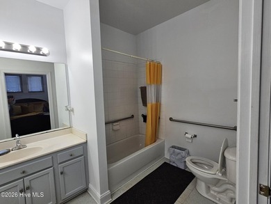 This cozy three-bedroom two-bathroom home is very close to - photo 8