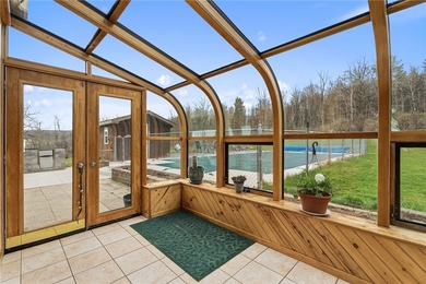 Set on 3 acres in the hills of Hector, this 3,100 sq ft - photo 2