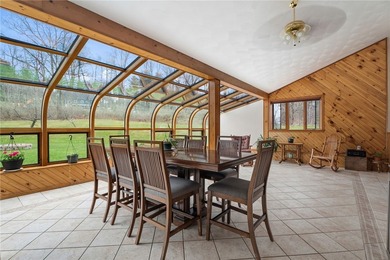 Set on 3 acres in the hills of Hector, this 3,100 sq ft - photo 5