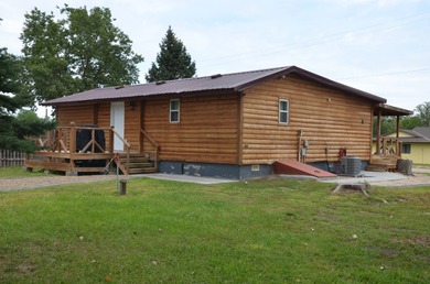 The handicap-accessible home comes fully furnished and turnkey