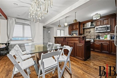 Beautifully redone 2 family house. Nothing to do but move in - photo 12