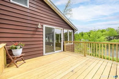 Perched above the water with expansive, unobstructed lake views - photo 3