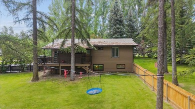 Ideally situated on Mallard Loop, this charming raised ranch - photo 4
