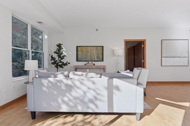 Step into this beautifully updated corner unit featuring fresh