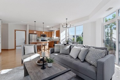 Step into this beautifully updated corner unit featuring fresh