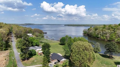 Perched above the sparkling waters of Lake Barkley, this - photo 14
