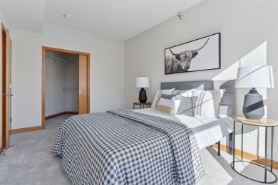 Step into this beautifully updated corner unit featuring fresh