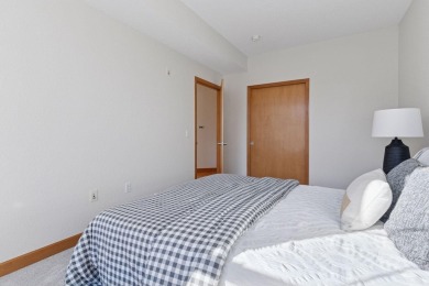 Step into this beautifully updated corner unit featuring fresh