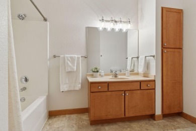 Step into this beautifully updated corner unit featuring fresh