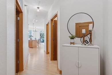 Step into this beautifully updated corner unit featuring fresh