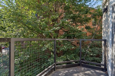 Step into this beautifully updated corner unit featuring fresh