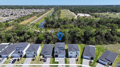 3.75% Assumable VA Loan ONLY. Located in the gated community of - photo 3