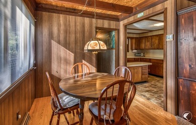Nestled in a quiet wooded setting, this charming chalet-style - photo 11