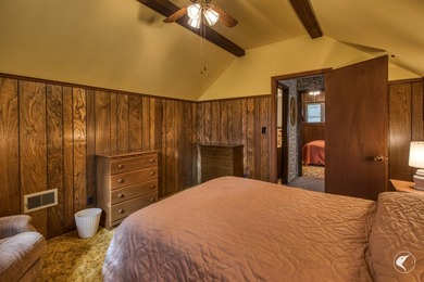 Nestled in a quiet wooded setting, this charming chalet-style - photo 15