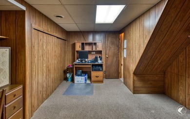 Nestled in a quiet wooded setting, this charming chalet-style - photo 17