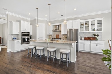 Gracefully positioned within the exclusive gated enclave of - photo 12