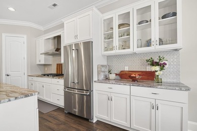 Gracefully positioned within the exclusive gated enclave of - photo 13