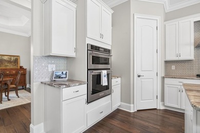 Gracefully positioned within the exclusive gated enclave of - photo 14