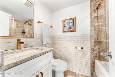 This condo set inside of Royal Mansions is private, surrounded - photo 17
