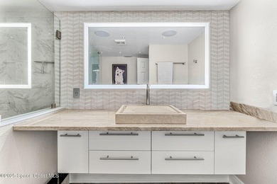 This condo set inside of Royal Mansions is private, surrounded - photo 25