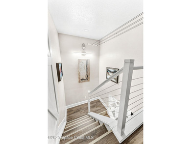 This condo set inside of Royal Mansions is private, surrounded - photo 28