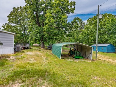 Well-maintained 3 bedroom, 2 bath mobile home on 74 acres. The - photo 33