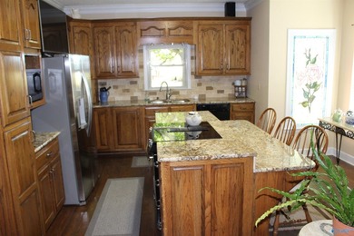 Estate Home with 46 acres, stocked pond, two bay RV bldg and - photo 7