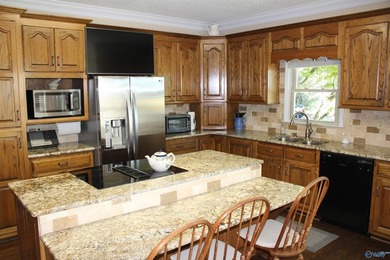 Estate Home with 46 acres, stocked pond, two bay RV bldg and - photo 8