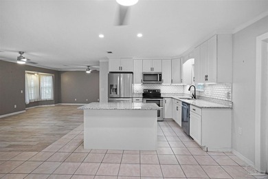 Welcome to this beautifully maintained brick home in the heart - photo 6