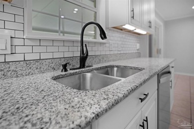 Welcome to this beautifully maintained brick home in the heart - photo 8