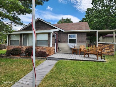 Lake Home For Sale in Beaverton, Michigan