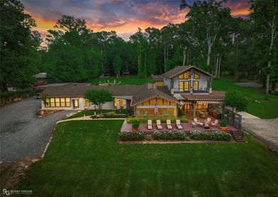 Welcome Home to this extraordinary lakefront retreat situated on - photo 1