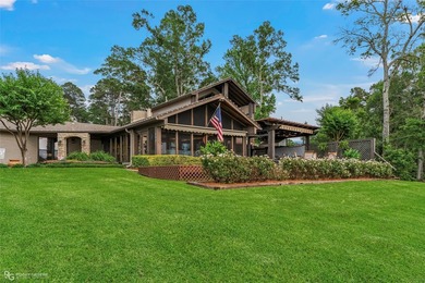 Welcome Home to this extraordinary lakefront retreat situated on - photo 2