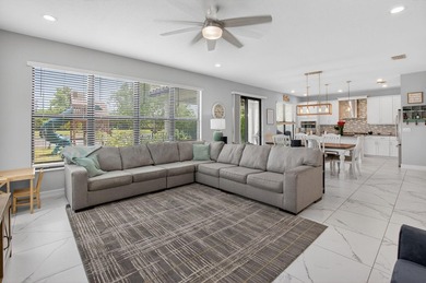 Discover waterfront living in Palm Meadows Estates. This - photo 12