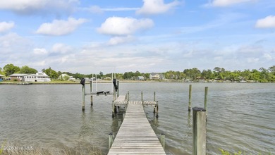 Warm, custom-built, and genuinely one of a kind, this waterfront - photo 3